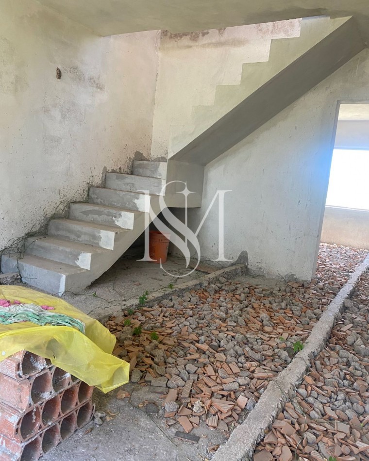 Terreno con Construccion a la venta