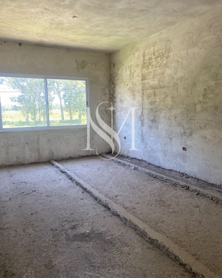 Terreno con Construccion a la venta